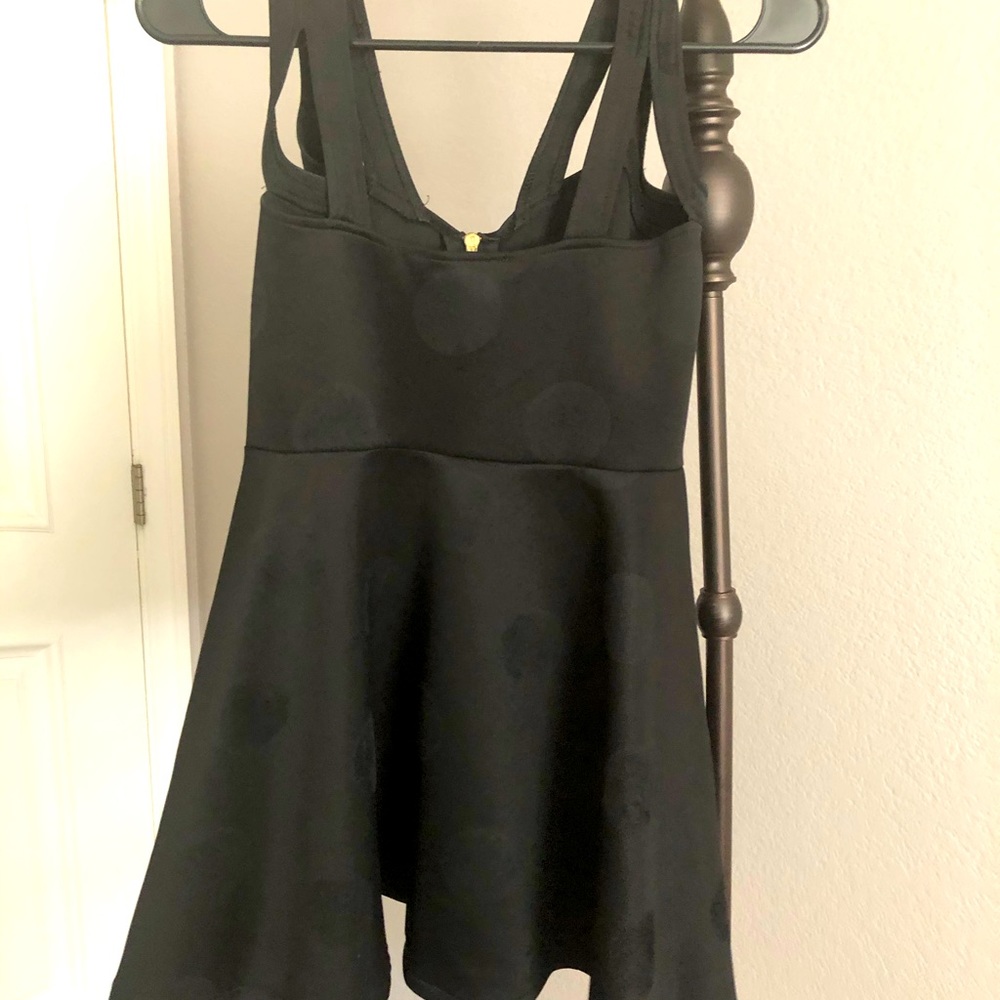 Black Polka dot zipper front top.  Slightly worn.